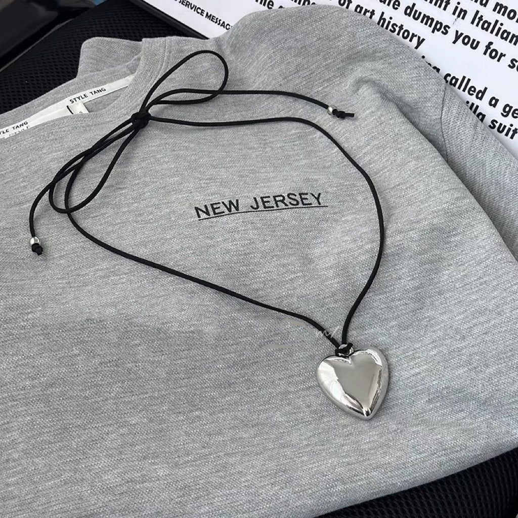 Damen Kette mit herzförmigem Anhänger und verstellbarem Baumwollband Shop Nory