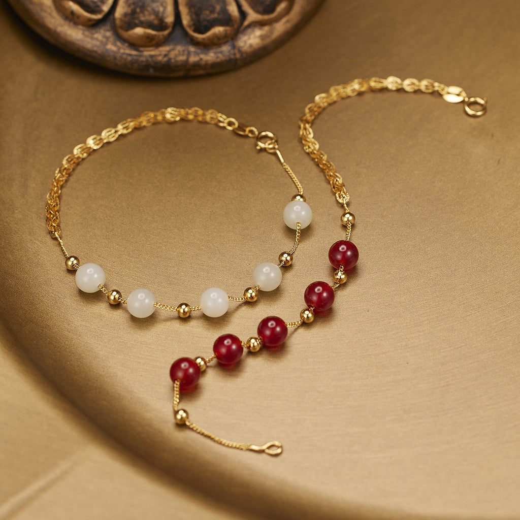 Damen zartes Armband mit hochwertigen roten Halbedelsteinen und goldener Gliederkette Shop Nory