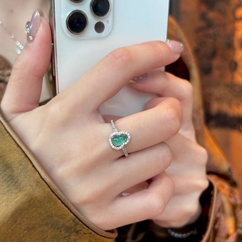Damen eleganter Ring mit ovalem Zirkonia und funkelndem Rahmen Shop Nory