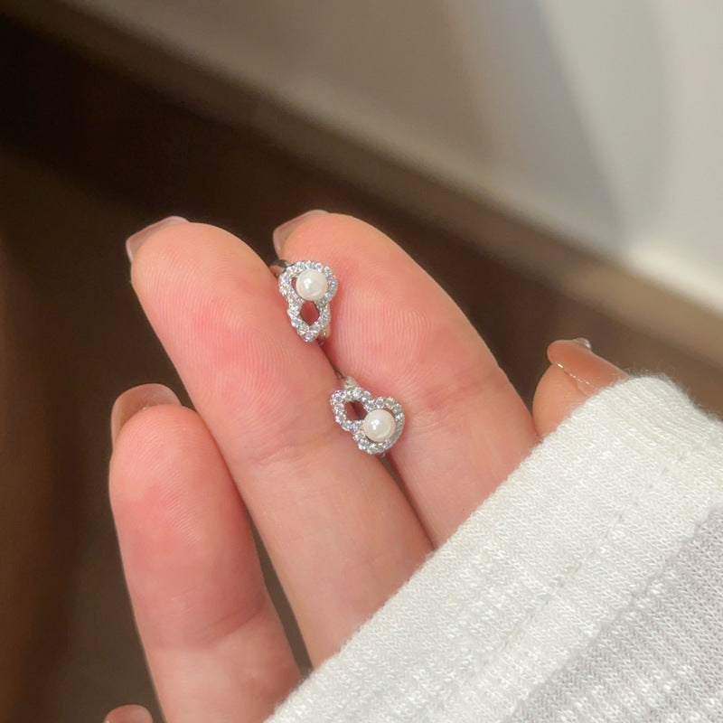 Damen Ohrstecker mit funkelndem Zirkon und elegantem Perlenmotiv Shop Nory