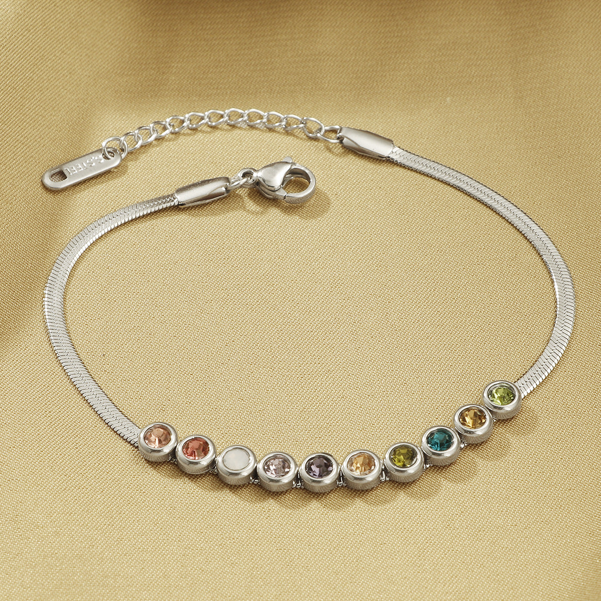 Damen Farbige Edelstein-betonte Armbanduhr Shop Nory