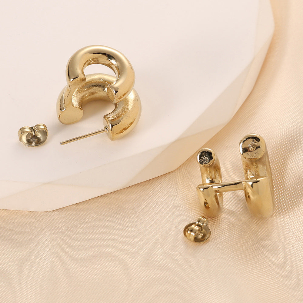 Damen Ohrstecker mit geschwungenem Design aus hochwertigem Edelstahl Shop Nory