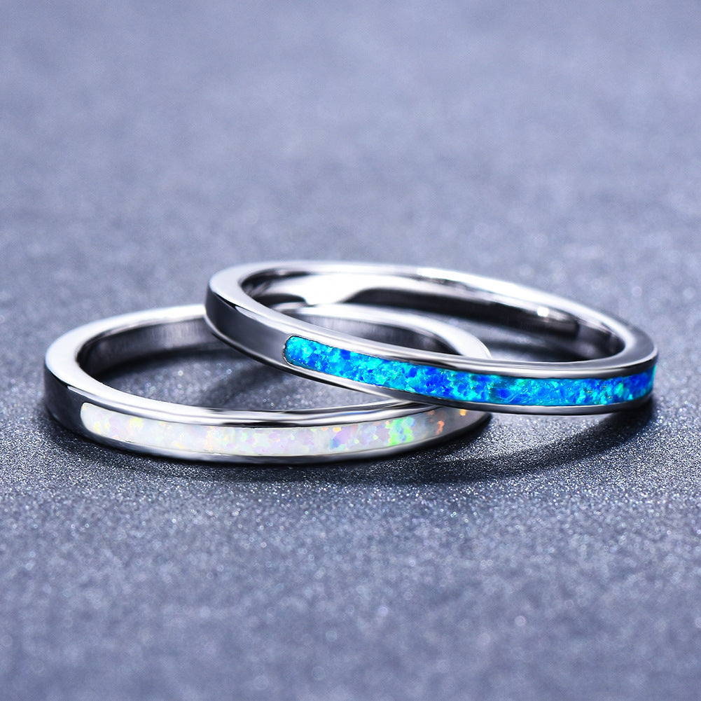 Damen Ring mit schimmerndem Opal und eleganter Edelstahlfassung Shop Nory