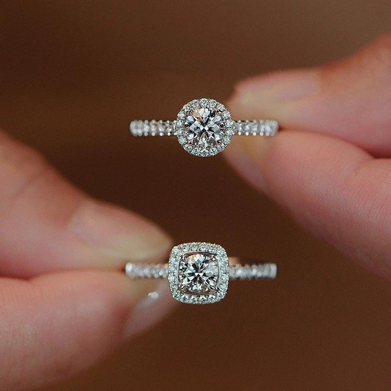 Damenring mit funkelndem Zirkonia und eleganter Kranzfassung Shop Nory