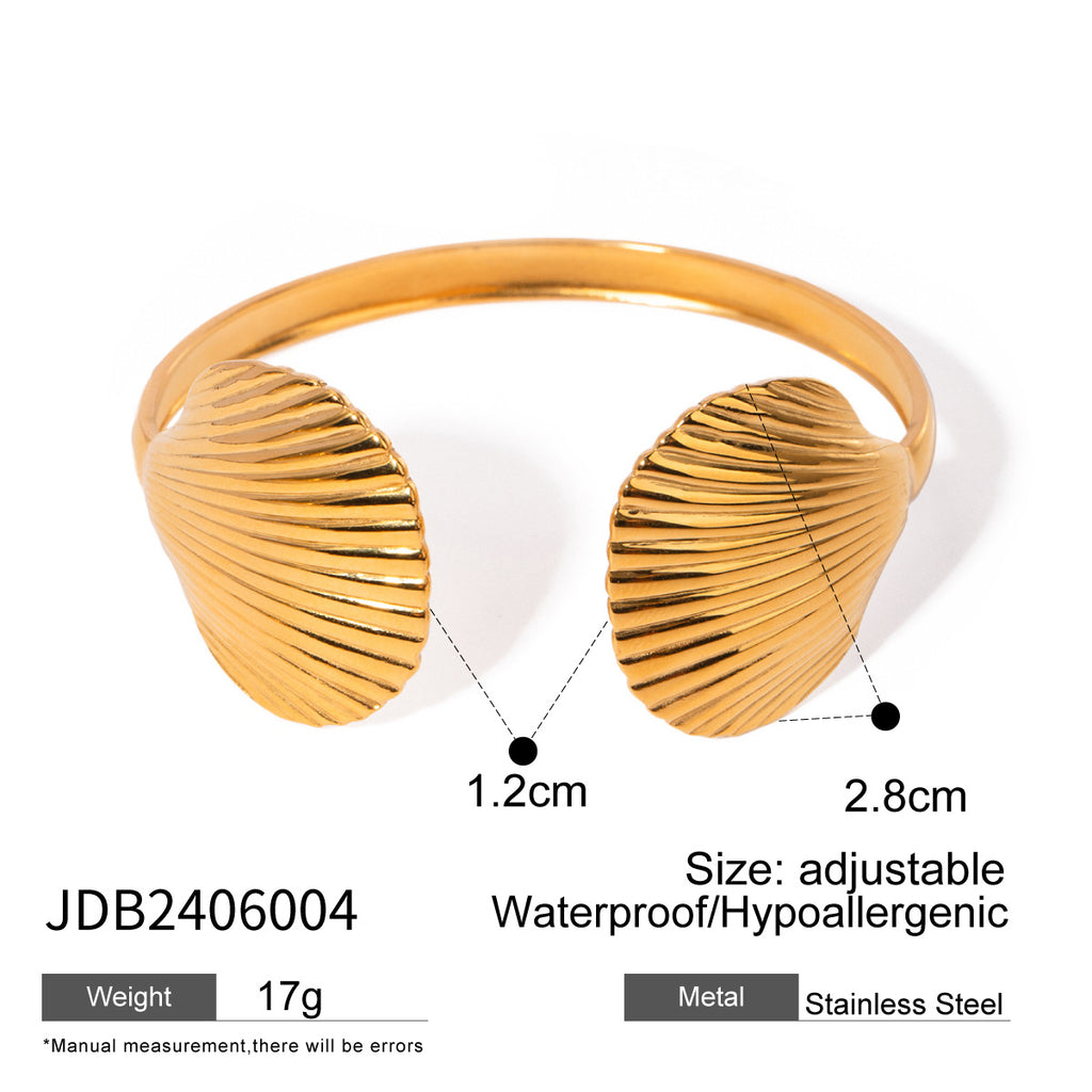 Damen Armreif mit kunstvollem Muschelmuster aus hypoallergenem Edelstahl Shop Nory