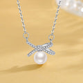 Damen Halskette mit elegantem Schleifenanhänger und luxuriöser Perle Shop Nory