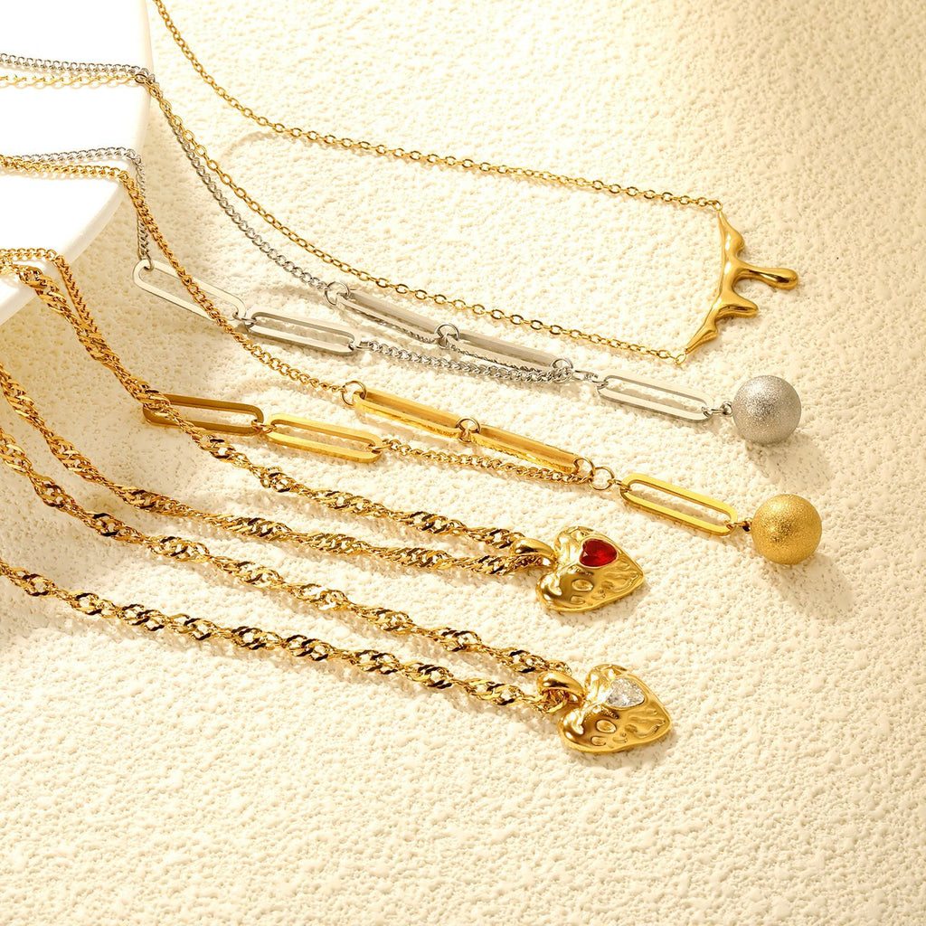 Damen Halskette mit herzförmigem Anhänger aus hochwertigem Edelstahl mit funkelndem Zirkonia Shop Nory