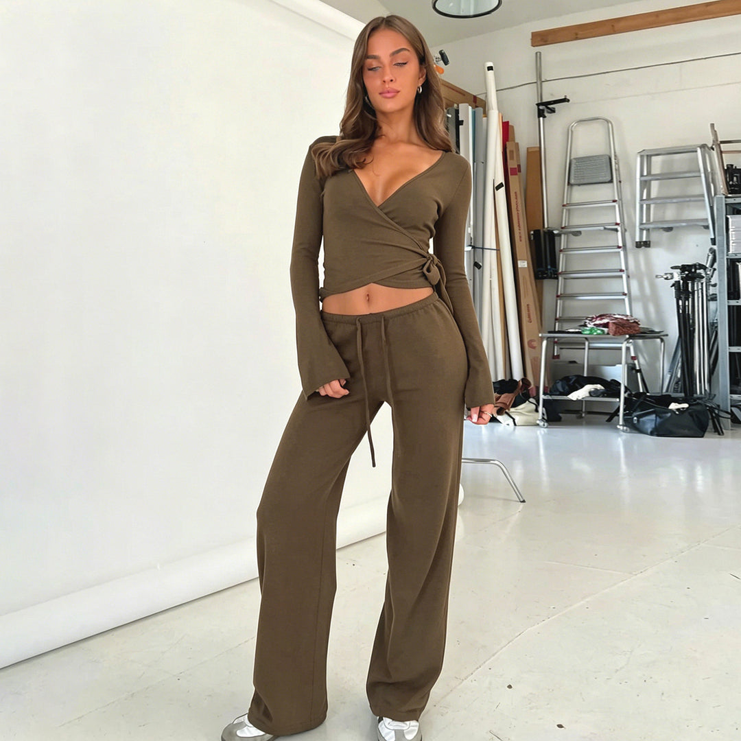 Damen nan Wickel-Cropped-Top mit tiefem V‑Ausschnitt, taillierter Wickelform und langen Glockenärmeln Shop Nory
