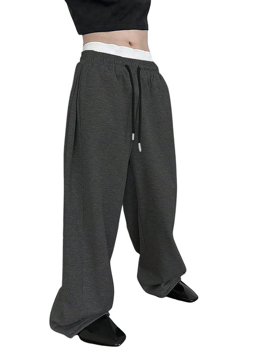 Unisex weite Sweatpants mit elastischem Bund, breitem Bein, Kordelzug und verdeckten Seitentaschen Shop Nory