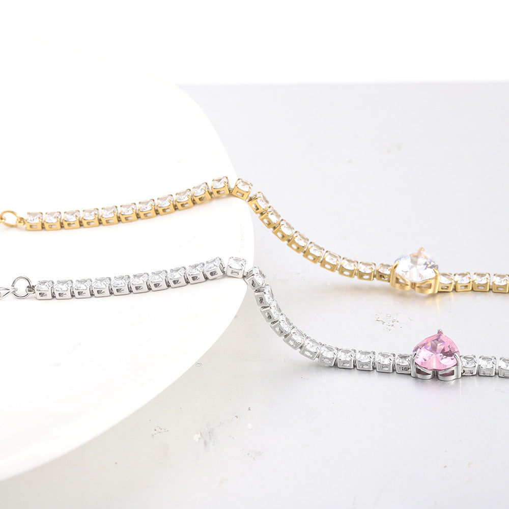 Damen Armband mit herzförmigem Amethyst und funkelnden Zirkonia Shop Nory