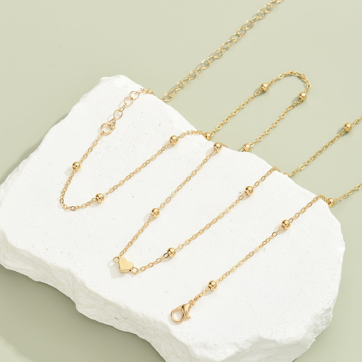 Damen Fußkette mit filigranem Herz-Design und funkelnden Akzenten Shop Nory