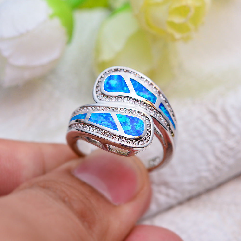 Damen Ring mit kunstvollem Opaldesign und funkelnden Zirkonia Shop Nory