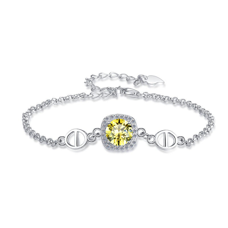 Damenarmband mit strahlend gelbem Kristall und funkelndem Zirkonia-Rahmen Shop Nory