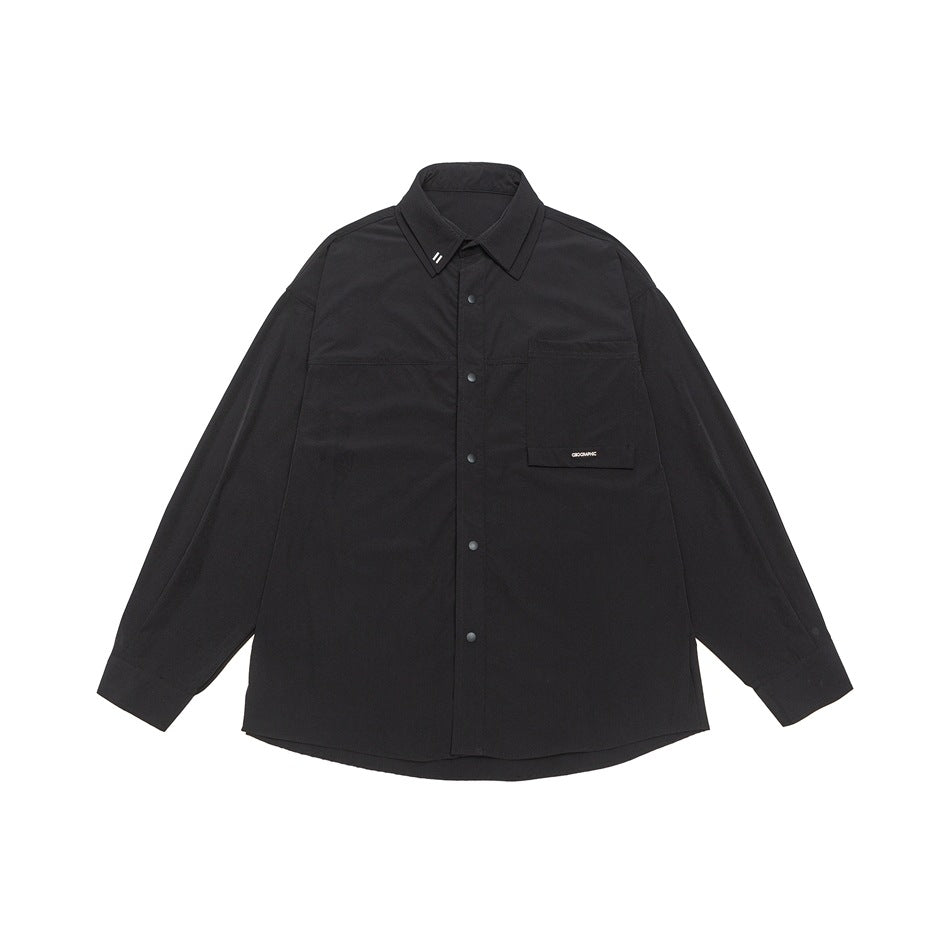 Unisex Oversize Hemd mit technischem Material, Brustklappe und gerundetem Saum Shop Nory
