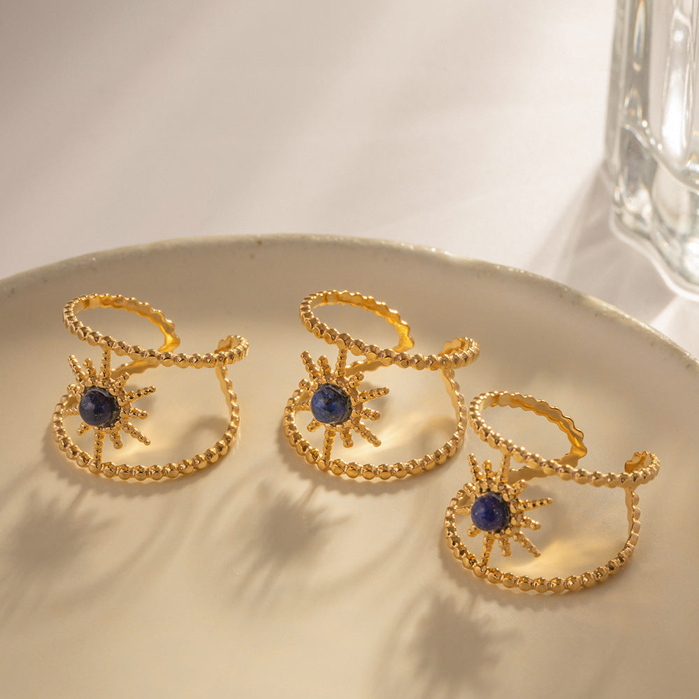 Damen Offener Ring mit filigranem Sonnenmotiv und hypnotisierenden Edelsteinen Shop Nory