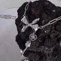 Damen Halskette mit verspieltem Schleifenanhänger und glitzerndem Zirkonia Shop Nory