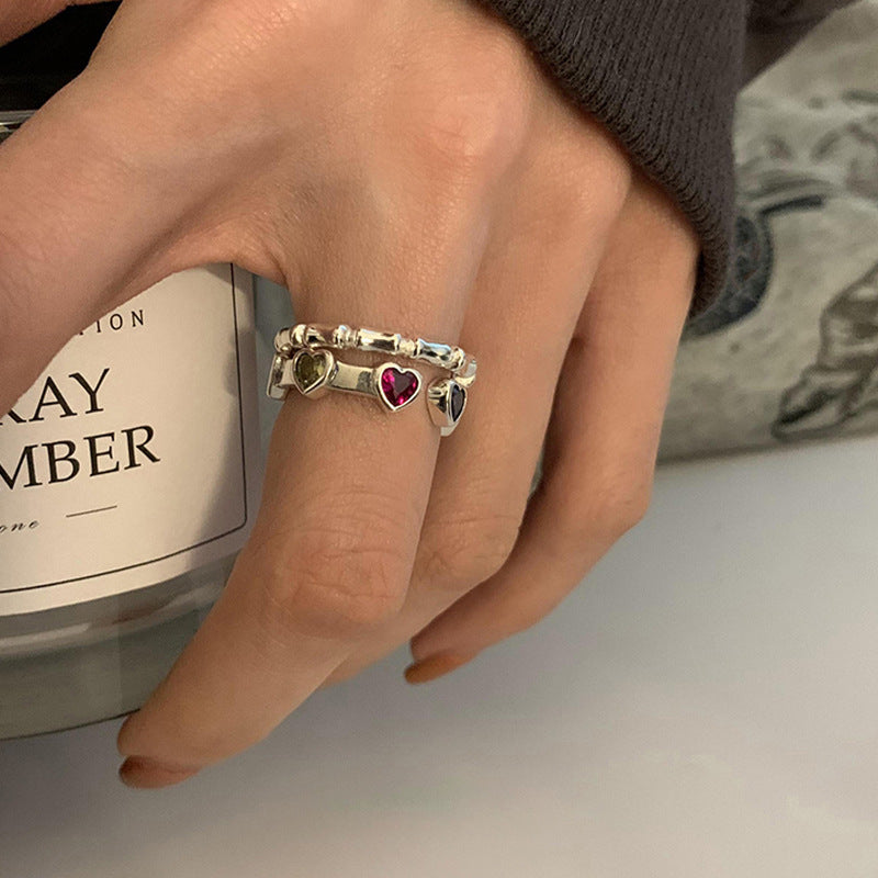 Damenring mit herzförmigen Steinchen und elegantem Design Shop Nory