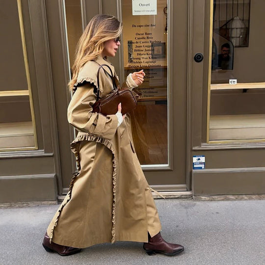 Damen maxilanger Trenchcoat mit Volant‑Schultercape und verstellbaren Manschetten Shop Nory