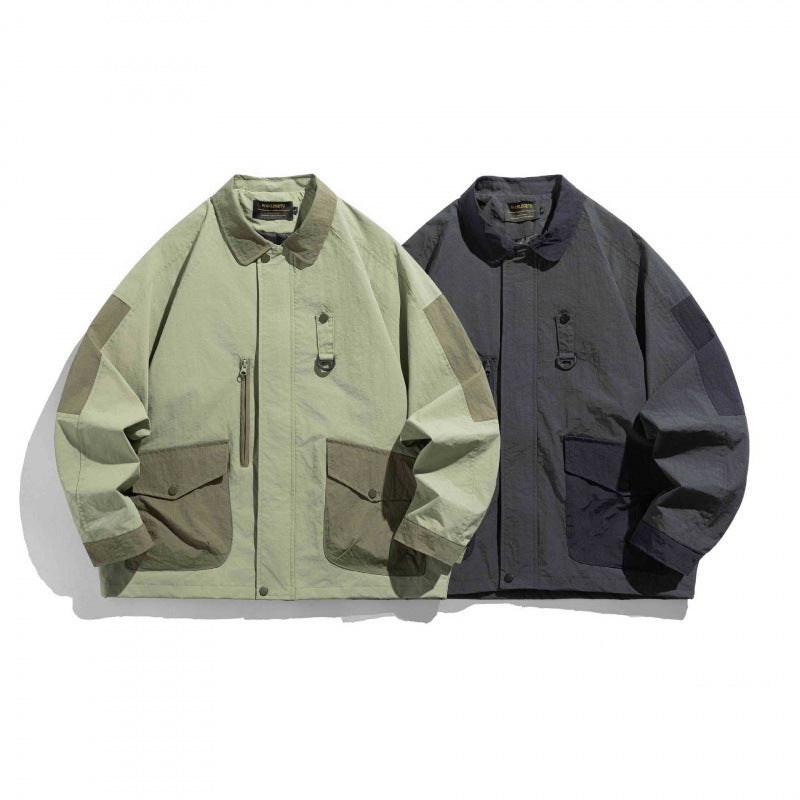 Unisex Oversize Utility-Fieldjacke mit aufgesetzten Taschen, Kontrastpaneelen und versteckter Reißverschlussleiste Shop Nory