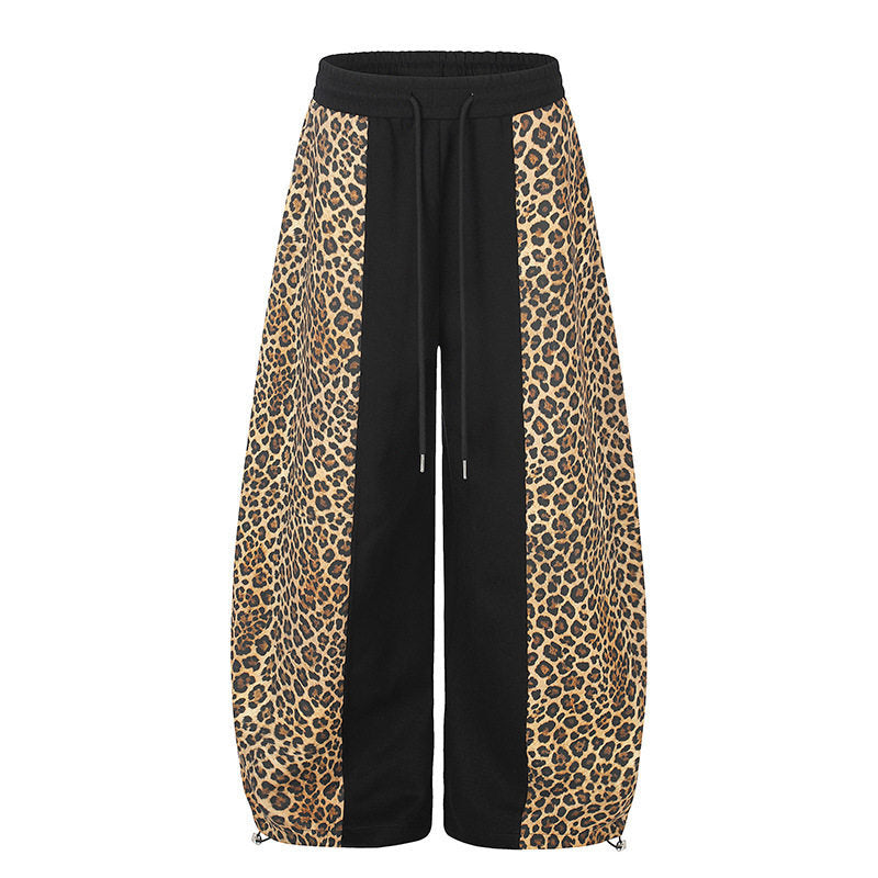 Damen Extraweite Palazzo-Joggpants mit Leo-Panelen, Tunnelzugbund und verstellbarem Saum Shop Nory