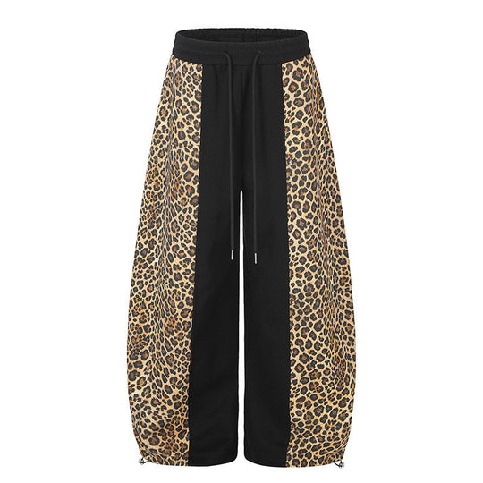 Damen Extraweite Palazzo-Joggpants mit Leo-Panelen, Tunnelzugbund und verstellbarem Saum Shop Nory