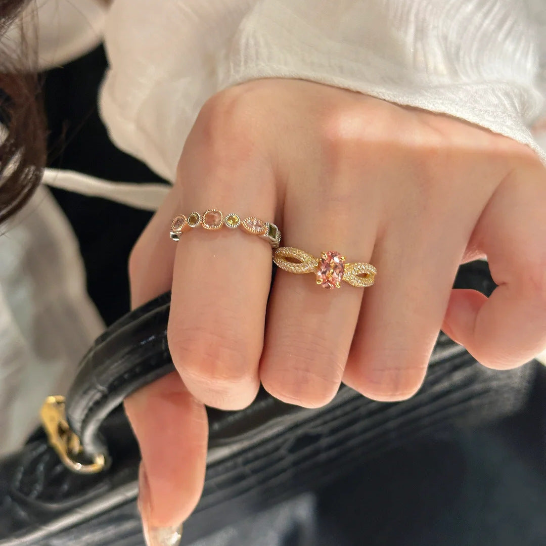 Damenring mit funkelnden Zirkonia-Details und romantischem Schleifenmotiv Shop Nory