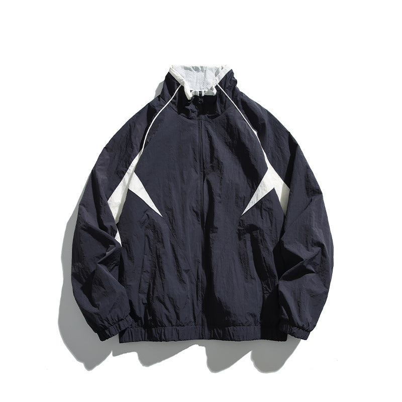 Unisex Leichte Boxy-Kapuzenjacke im Windbreaker-Stil mit Kontrastpaneelen und Raglanärmeln Shop Nory