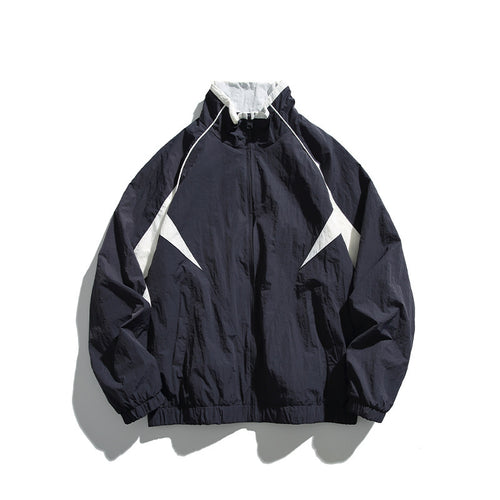 Unisex Leichte Boxy-Kapuzenjacke im Windbreaker-Stil mit Kontrastpaneelen und Raglanärmeln Shop Nory