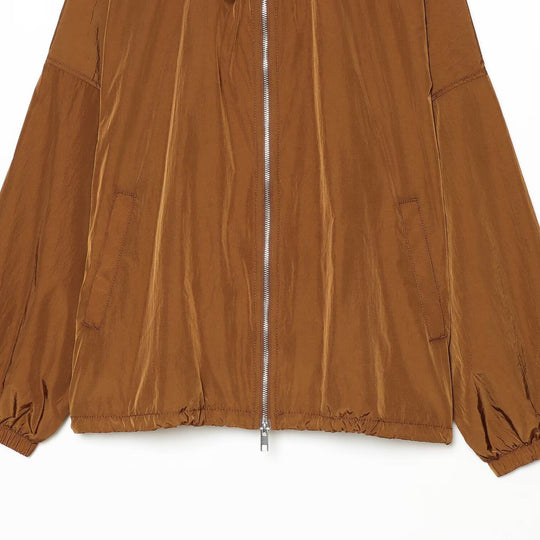 Damen Leichte Kapuzen‑Windjacke aus glänzendem Nylon mit Tunnelzug und Zwei‑Wege‑Reißverschluss Shop Nory