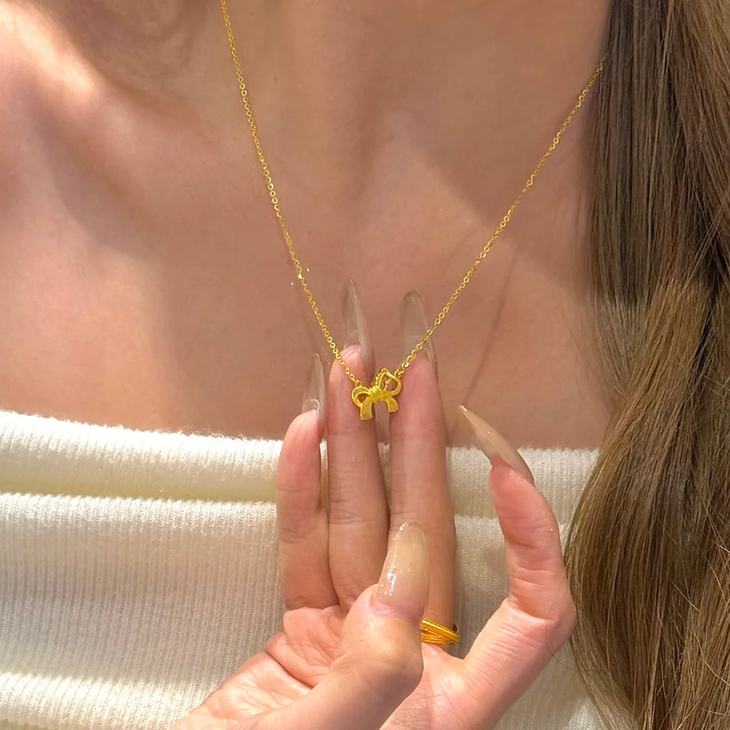 Damen Halskette mit elegantem Schleifenanhänger aus hochwertigem Edelstahl Shop Nory