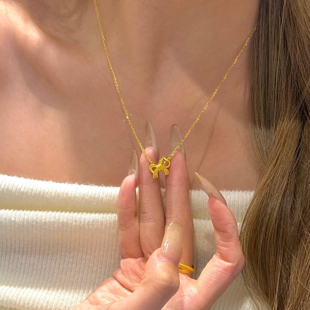 Damen Halskette mit elegantem Schleifenanhänger aus hochwertigem Edelstahl Shop Nory