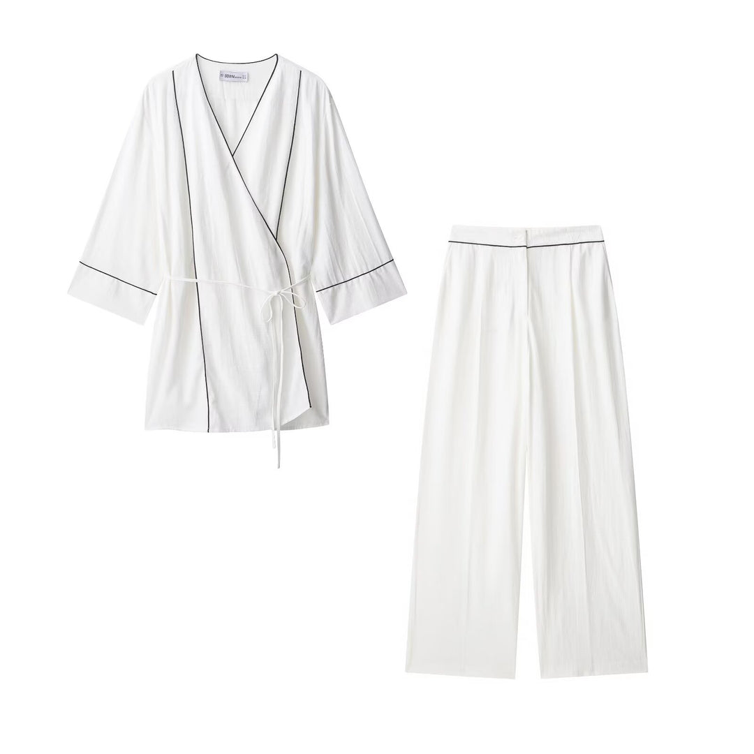 Damen Weite Plisseehose mit hohem Bund, verdeckter Knopfleiste und Kontrastpaspel Shop Nory