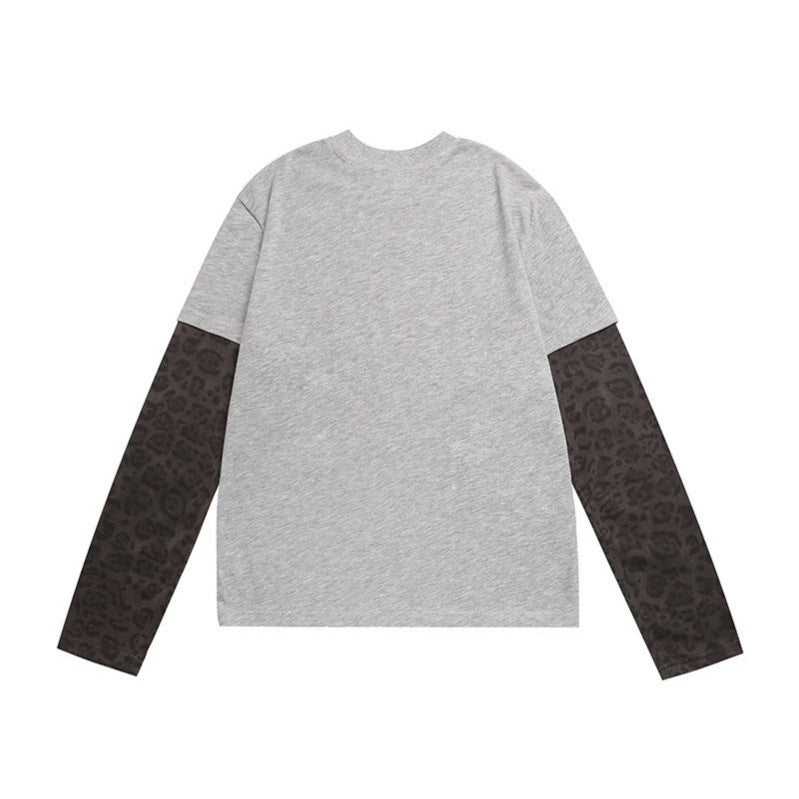 Damen Lagen-Langarmshirt mit Kontrastärmeln im Leo-Muster und Statement-Print Shop Nory