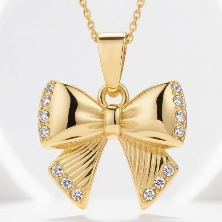 Damen Halskette mit elegantem Schleifen-Anhänger und funkelnden Zirkonia-Details Shop Nory