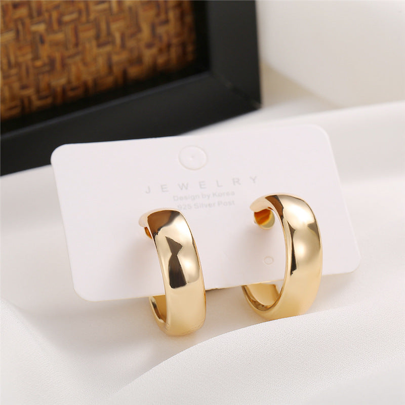 Damen Creolen mit hochwertiger Goldoberfläche und modernem Design Shop Nory