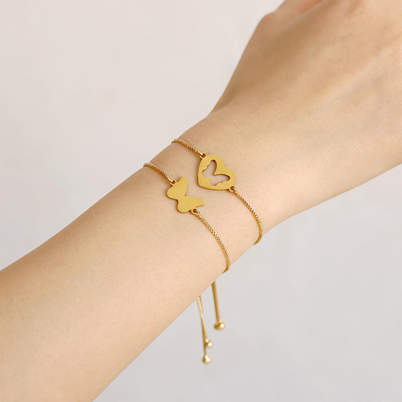 Damen Armband mit filigranem Schmetterlings- und Herzdesign Shop Nory