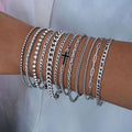 Damen Armreifen-Set mit funkelnden Kristallen und kraftvollen Kettenvariationen Shop Nory