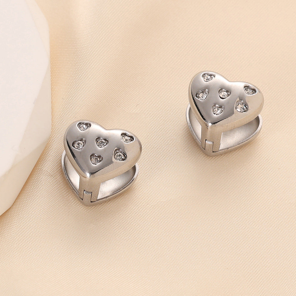 Damen Ohrringe mit herzförmigem Design und funkelnden Zirkonia Shop Nory