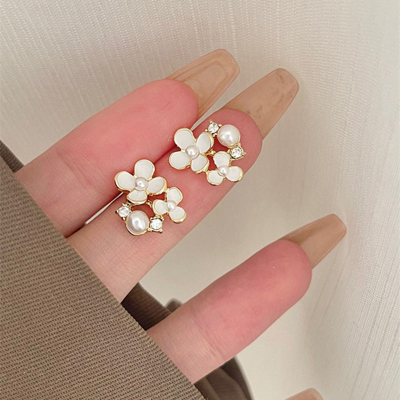 Damen Ohrringe mit floralem Design und perlverzierten Akzenten Shop Nory