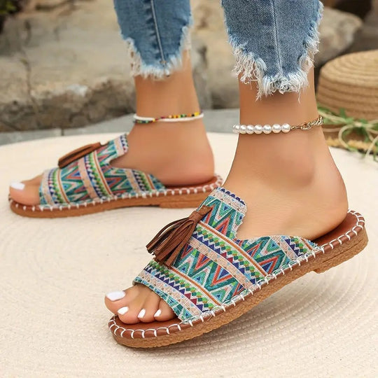 Damen Ethno-Slipper-Sandalen mit Quaste und handgenähter Ziernaht Shop Nory