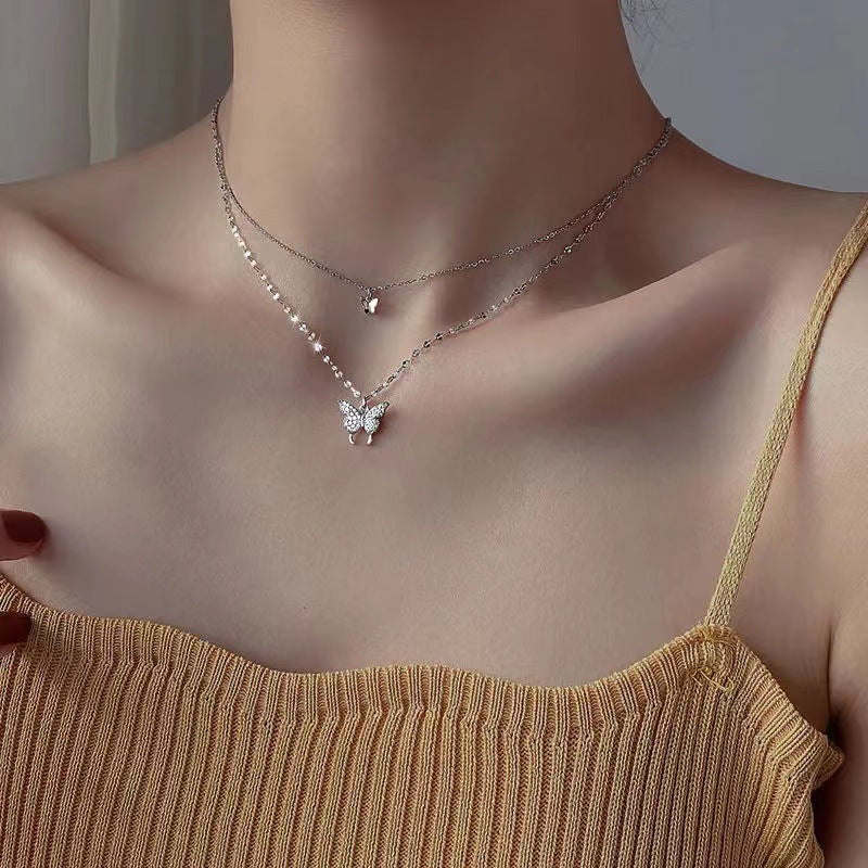 Damen Halskette mit filigranem Schmetterlings-Design und funkelnden Zirkonia Shop Nory