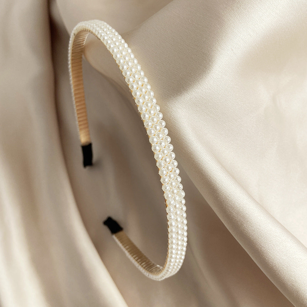 Damen Haarband mit eleganten Perlenverzierungen Shop Nory