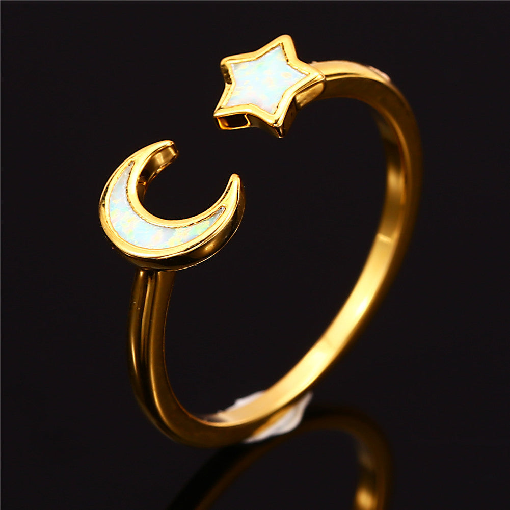 Damen Ring mit kunstvollem Mond- und Sternmotiv aus schimmerndem Opal Shop Nory