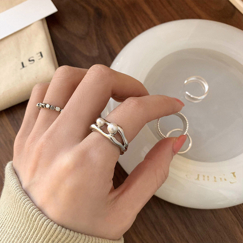 Damen Offener Ring mit filigranem Design und eleganten Perlen Shop Nory