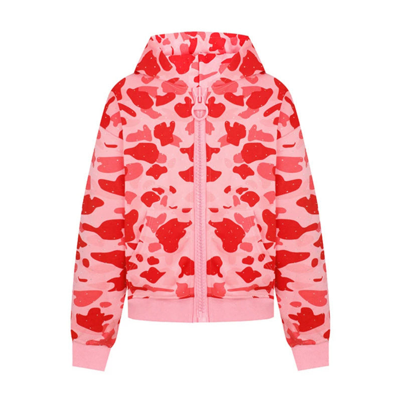 Damen Kapuzenjacke im Camouflage‑Print mit durchgehendem Reißverschluss, Kängurutasche und Rippbündchen Shop Nory