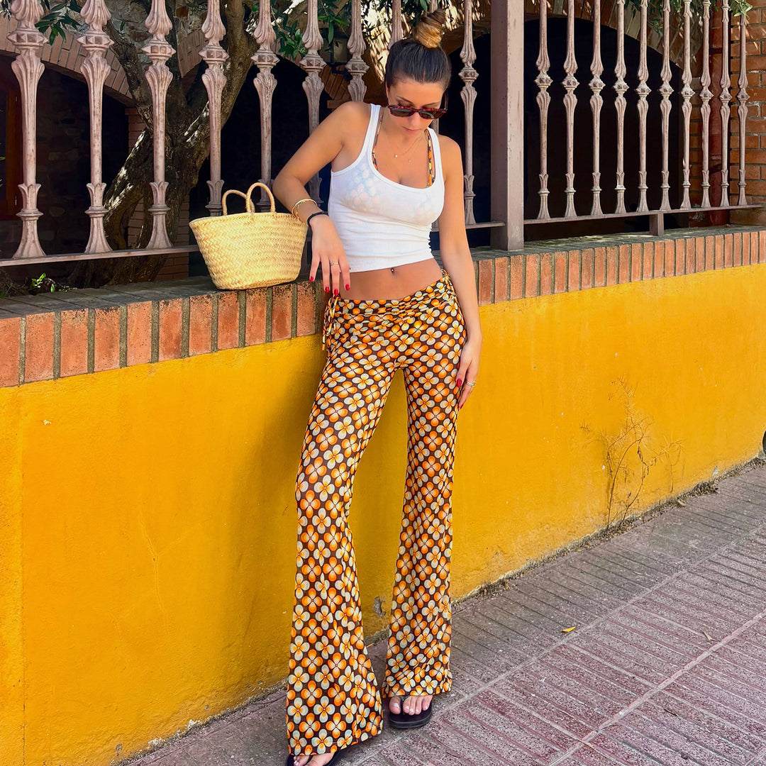 Damen nan ausgestellte Schlaghose mit hoher Taille, seitlichen Kordelzügen und retro Blumenprint Shop Nory