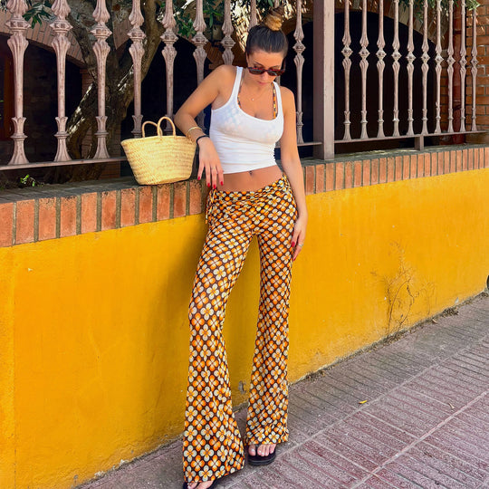 Damen nan ausgestellte Schlaghose mit hoher Taille, seitlichen Kordelzügen und retro Blumenprint Shop Nory