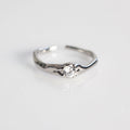 Damen zierlicher und geschwungener Ring mit funkelndem Stein Shop Nory