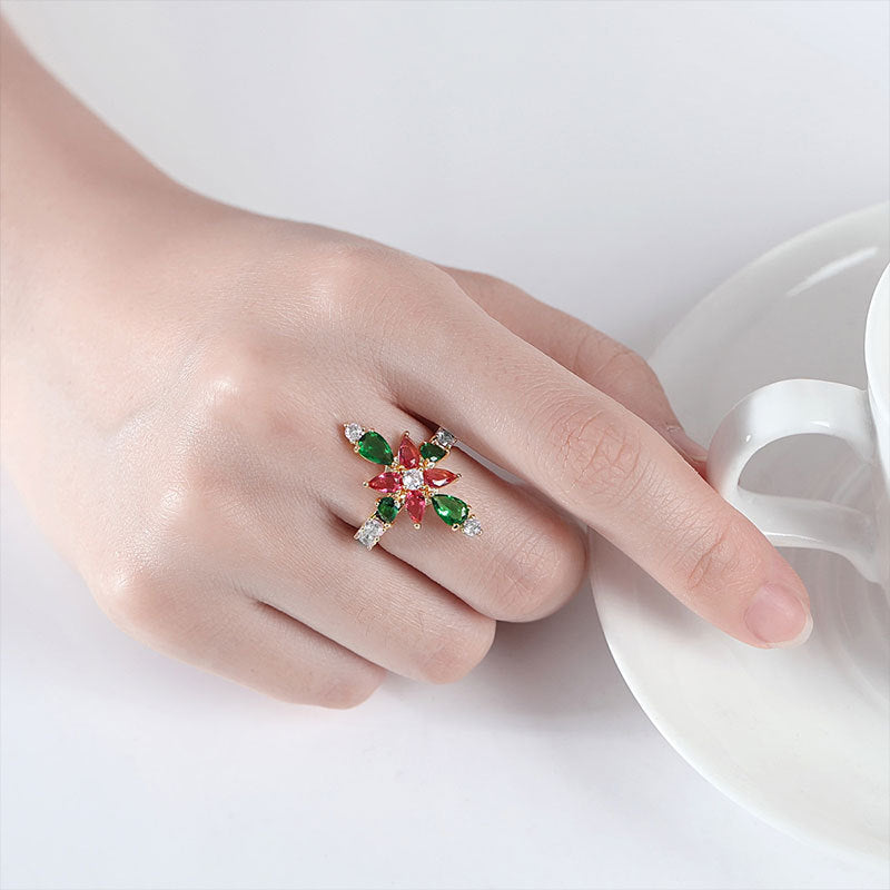 Damenring mit kunstvollem Blumenmuster und funkelnden Edelsteinen Shop Nory