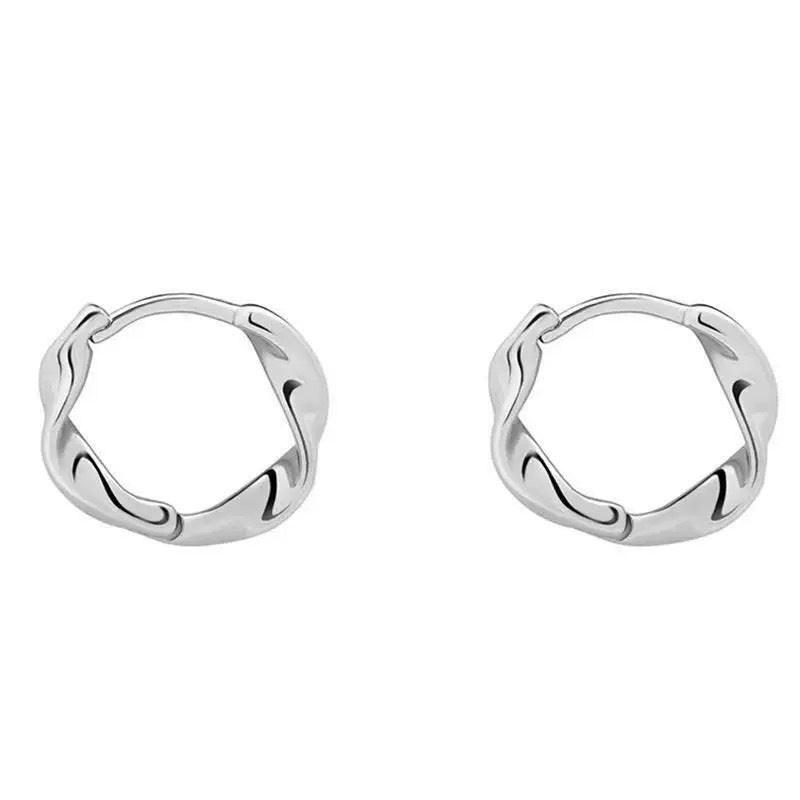 Damen Ring mit modernem, skulpturalem Design und eleganten Zierschlaufen Shop Nory